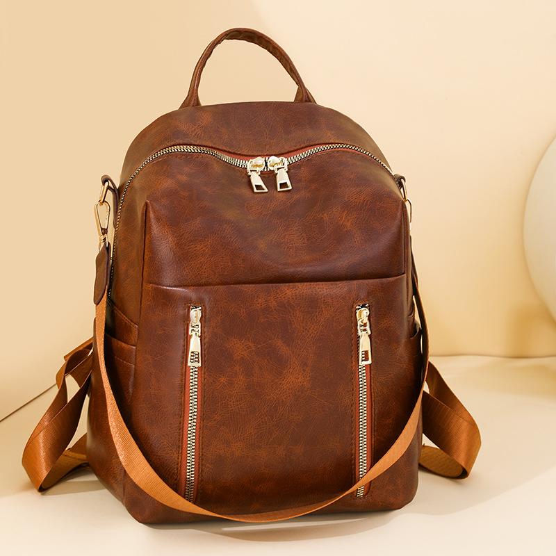 Simple Backpack Women's New Trend Fashion Pu Soft Leather Backpack Large Capacity Commuter Travel Bag