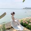 Fog Moon White Early Spring New French Vacation Neck Hollow Embroidered Lace-up Dress