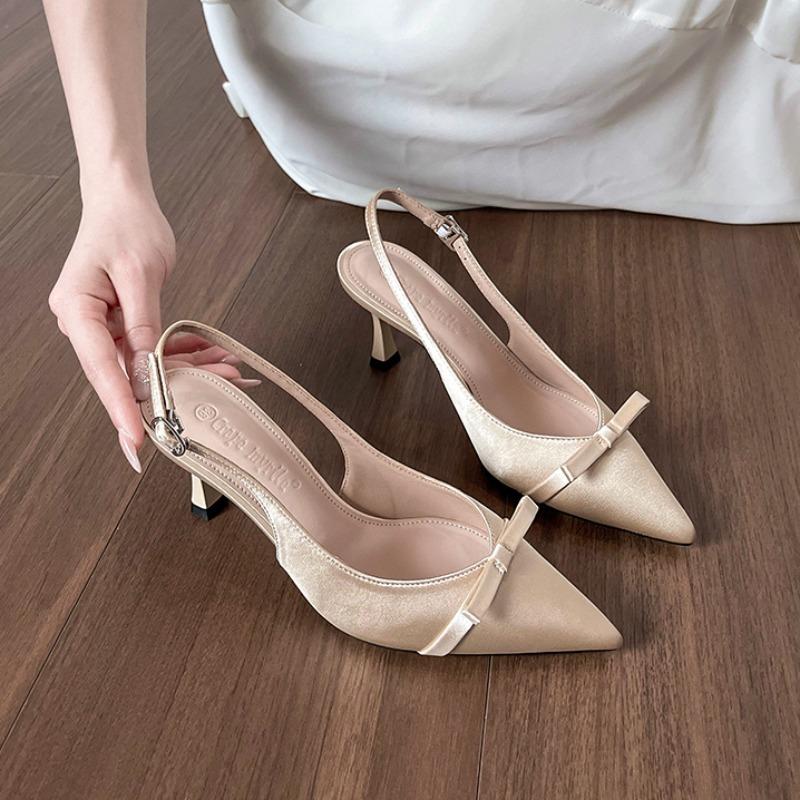

Pointed high heels Baotou empty sandals spring and summer new bow temperament versatile light mouth single shoes 40