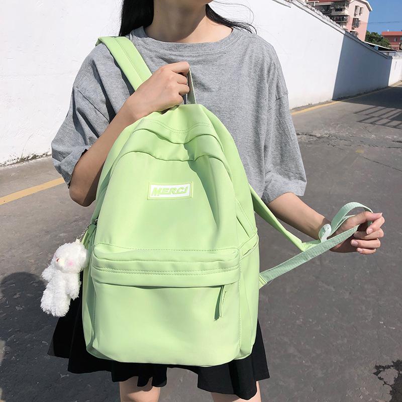 High-value schoolbag female Japanese ins large-capacity backpack solid color high school college student simple backpack