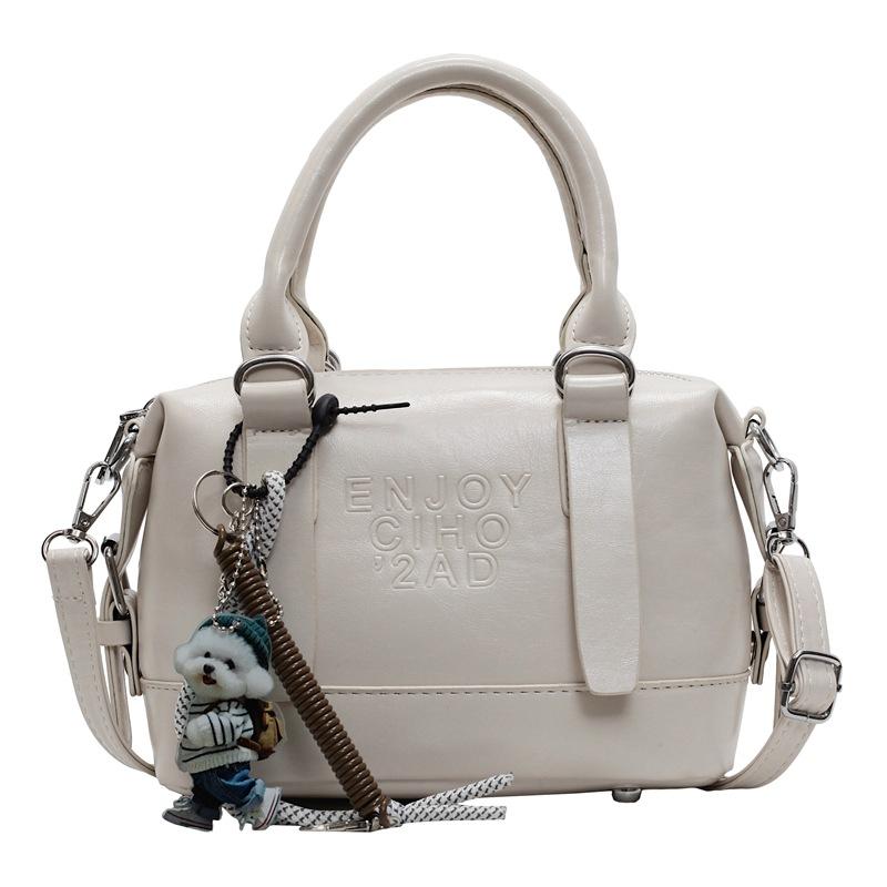 Korean Version of the New High-end College Temperament Portable Pillow Bag Women's Leisure Commuting Versatile Messenger Boston Bag