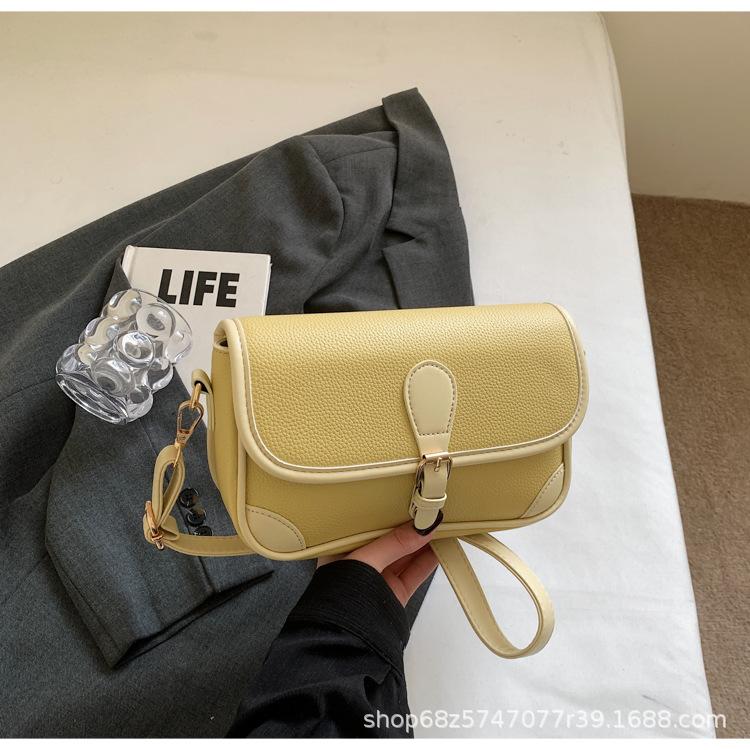 

One-shoulder women s texture, large-capacity commuting, contrasting color, retro new trend, 2025 saddlebag, fashion niche crossbody bag жёлтый