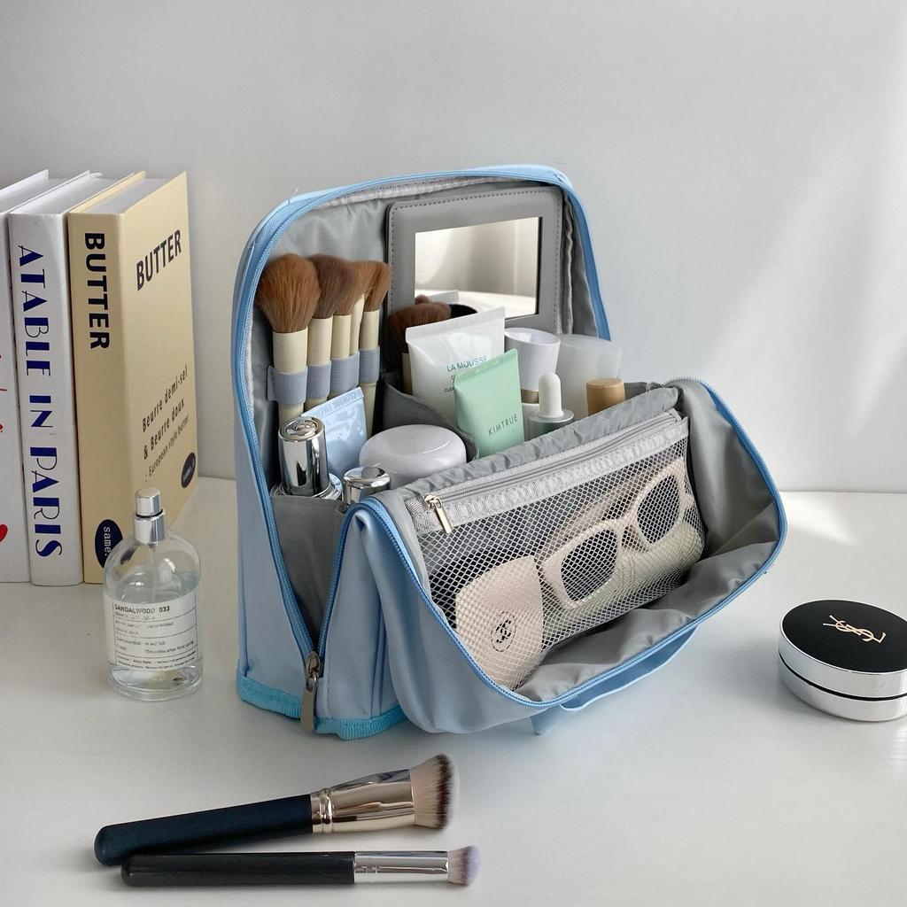 Portable Large Capacity Makeup Bag with Mirror, Hangable on Suitcase, Compartmentalized Cosmetic Storage Pouch.