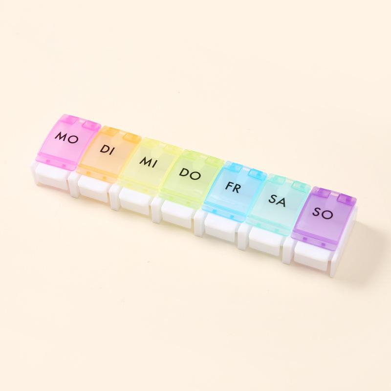 

Rainbow Bounce Button Medicine Box Portable 7-Grid Travel Divided Tablet Storage Box organizer shelf medicine organizer