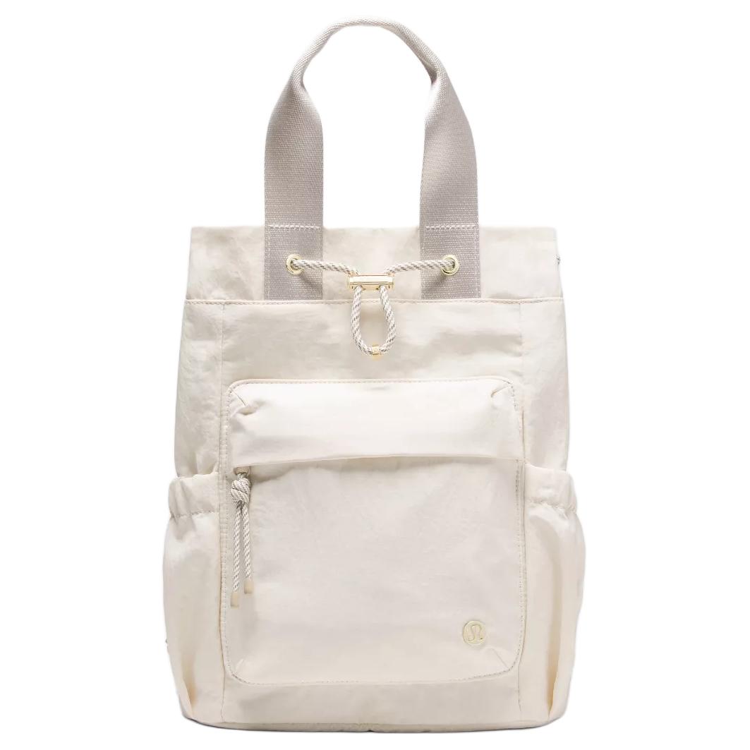 

Lululemon Convertible Series 13.5L Drawstring Closure Adjustable Shoulder Strap Compact Convertible Nylon Crossbody Backpack LW9GB0S-075059 Light Ivory & Eccentric Khaki & Gold
