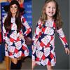 Elegant Girls Children Xmas Mother And Daughter Santa Bow Print Dress For Festive Celebrations