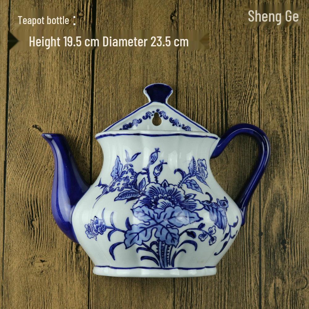 Hand-Painted Blue and White Ceramic Wall Vase with Floral and Bird Design