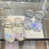 Children's luminous sandals 2026 season children's lights bow princess shoes lights rhinestone hollow sandals