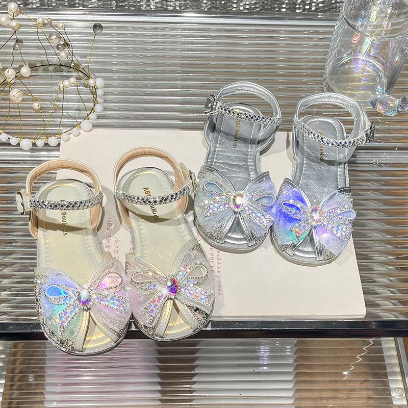 Children's luminous sandals 2026 season children's lights bow princess shoes lights rhinestone hollow sandals