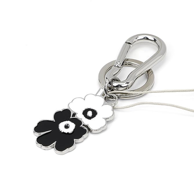 Marimekko Puhallus Unikko I Kioski Key Chain (Black and White) 093606 910. This black and white metal floral logo keychain features a Nordic
