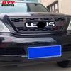 Fits 2003-2009 Lexus GX470: Black grille with integrated lights and amber accents.