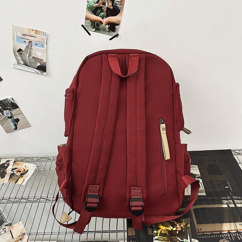 New large-capacity schoolbag men's trendy cool couple casual backpack Korean version ins junior high school student computer backpack