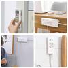 Non-punching self-adhesive plug holder 12 pcs desktop plug storage socket fixing wall cable manager