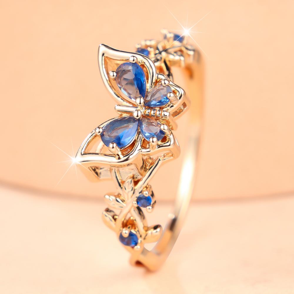 Elegant Gold Color Blue Zircon Flower Side Butterfly Ring for Women Daily Wear
