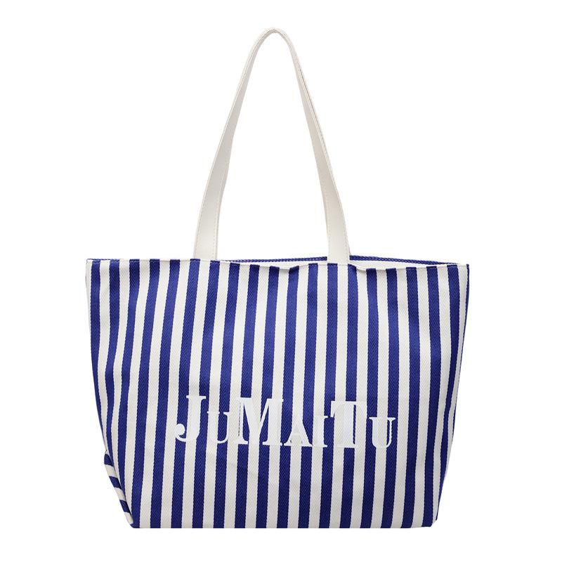 Niche design fashionable striped tote bag women's new large-capacity lazy wind shoulder bag canvas bag