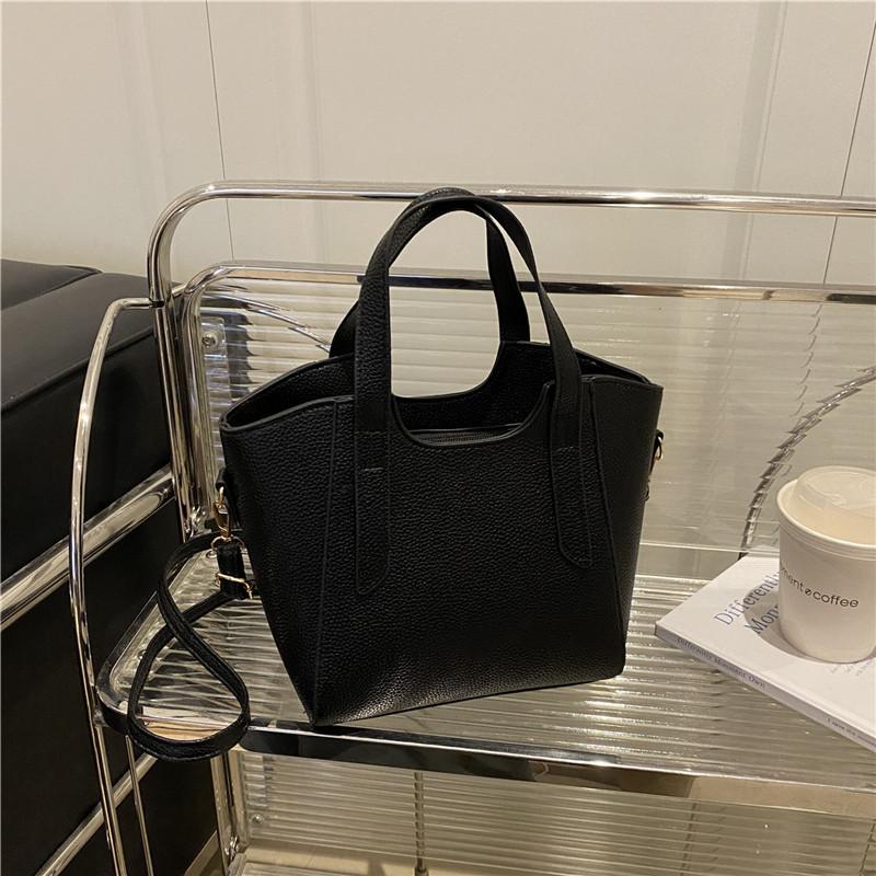 

Повседневная сумка-ведро однотонного цвета для поездок на работу, женская, высококлассный темперамент, зарубежный стиль, новая летняя текстурная сумка-мессенджер чёрный