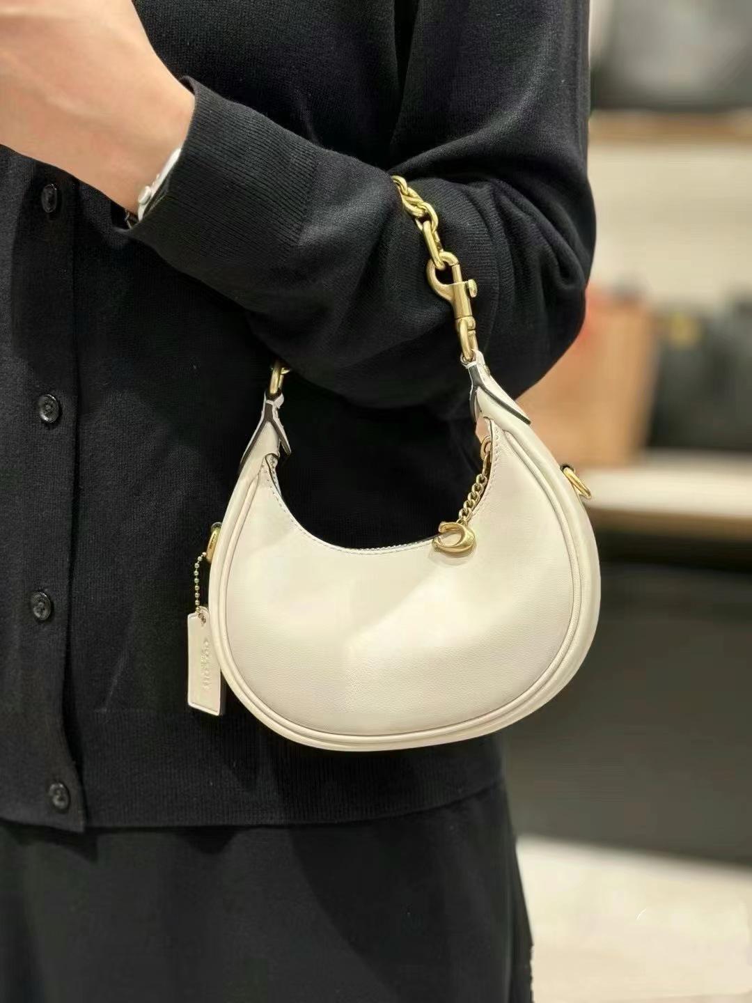 

2024 Koujia Jonie Mini Half-Moon Crossbody Leather Bag - женская сумка для переноски и ношения на плече 15 x 7 x 6 cm белый