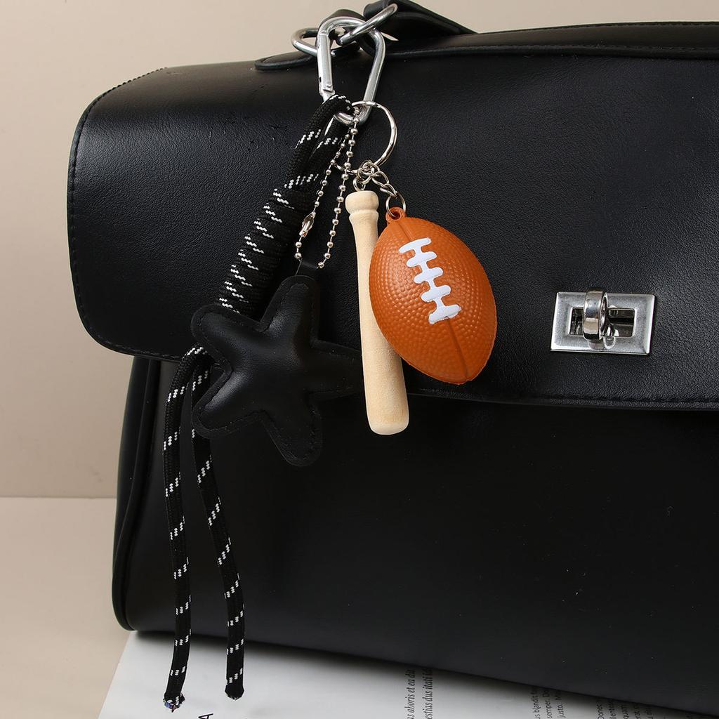 Cross-border hot-selling leather five-pointed star bag pendant camera baseball football DIY bag pendant keychain
