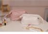 Double-Layer Cloud Makeup Bag - Large Capacity, Portable, Waterproof Toiletry Bag for Travel and Evening Parties.