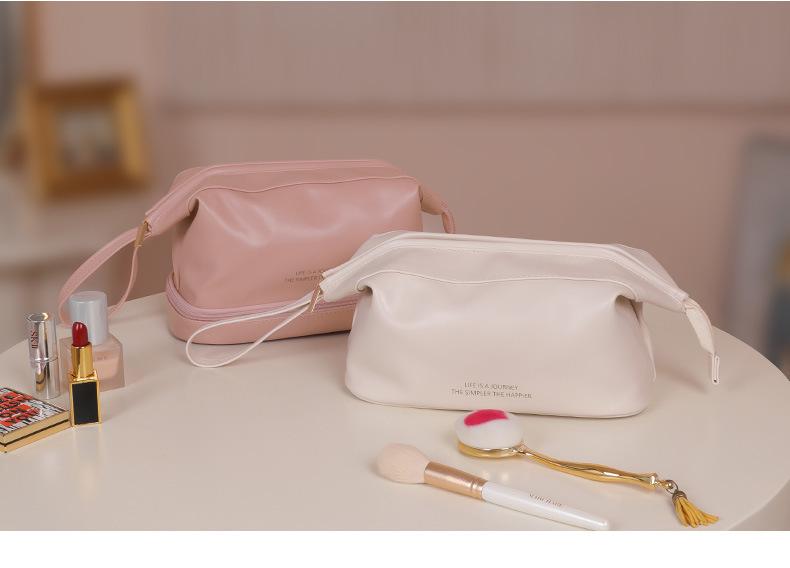 Double-Layer Cloud Makeup Bag - Large Capacity, Portable, Waterproof Toiletry Bag for Travel and Evening Parties.