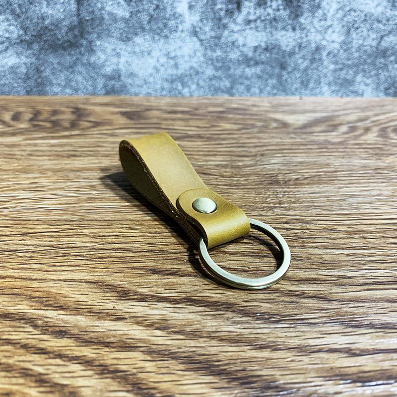 

Винтажный кожаный брелок Crazy Horse - унисекс бронзовый брелок для подарков Length 7cm Width 1.7cm