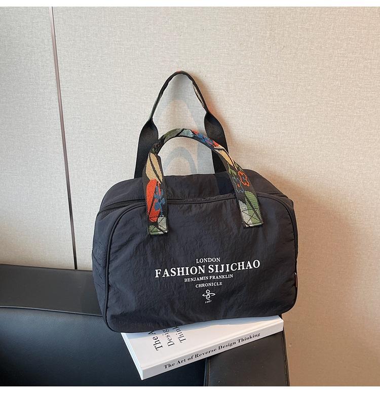 

Printed large-capacity nylon cloth business trip duffel bag Women s versatile storage bag Portable and lightweight shoulder armpit bag