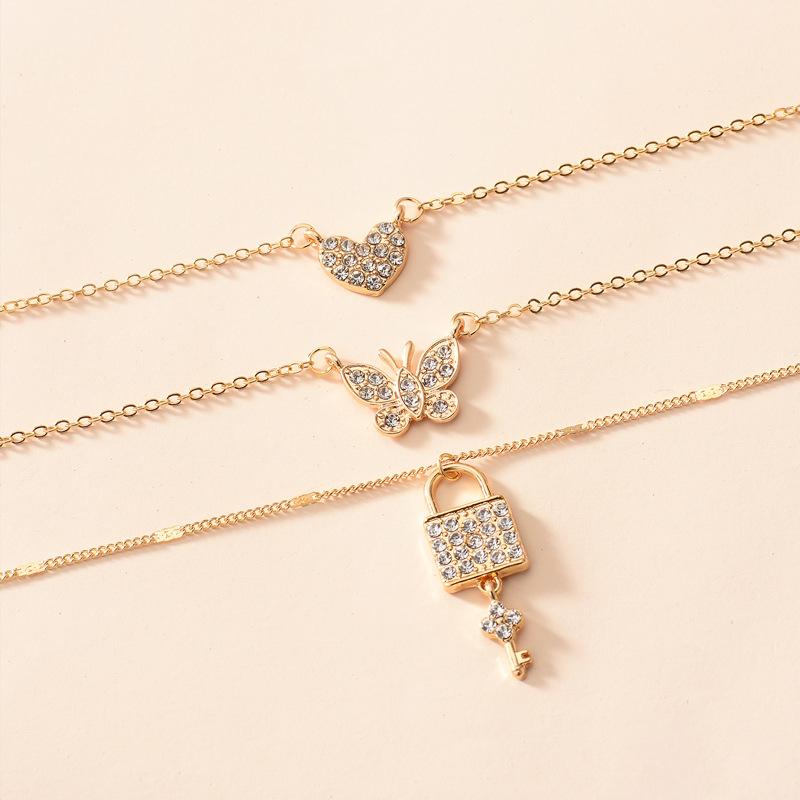 Butterfly love necklace European and American new personalized jewelry key pendant multi-layer women's street shot crystal sweater chain