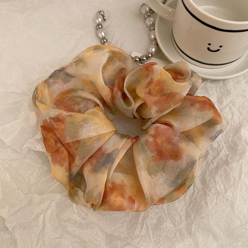 

Silk Satin Tie-Dye Orange Blossom Scrunchie – Elegant Women s Hair Accessory