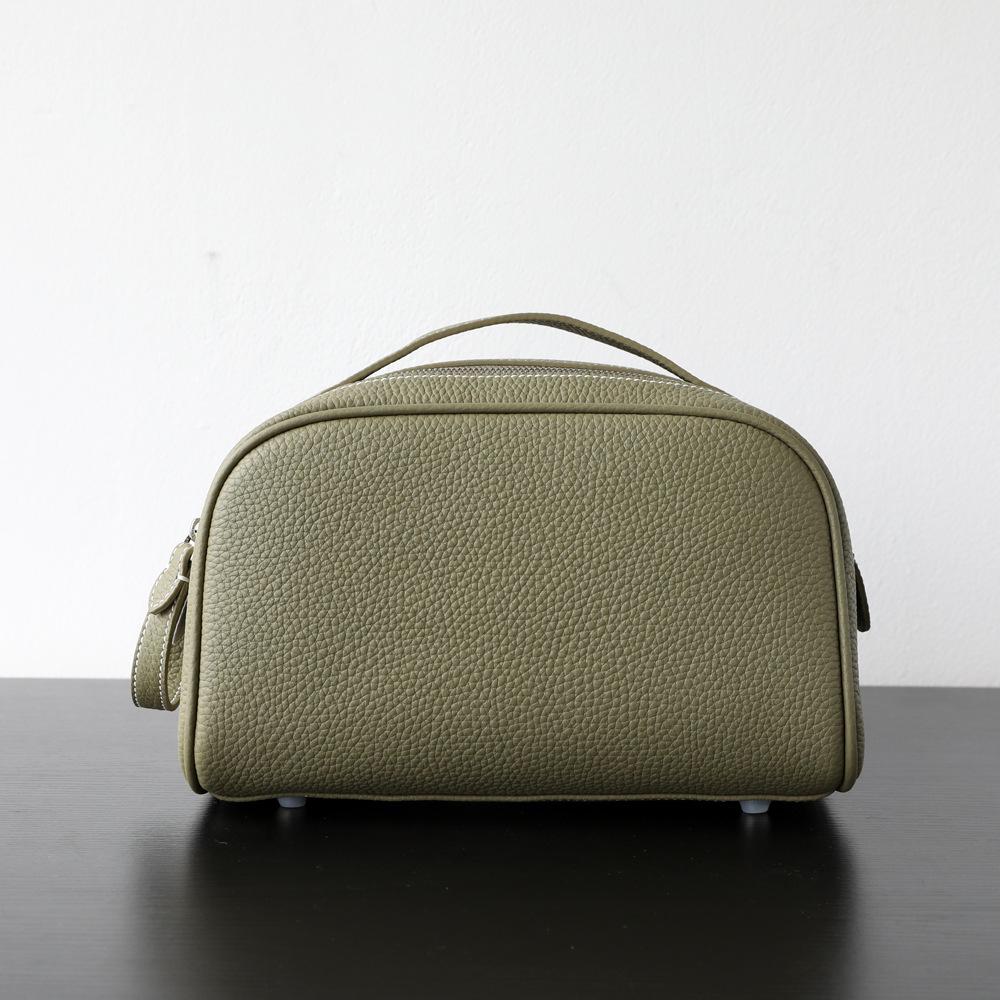 

New First-layer Cowhide Cosmetic Bag Women s Portable Travel Toilet Bag Ins Style Advanced Cosmetic Storage 24x14.5x15cm зелений