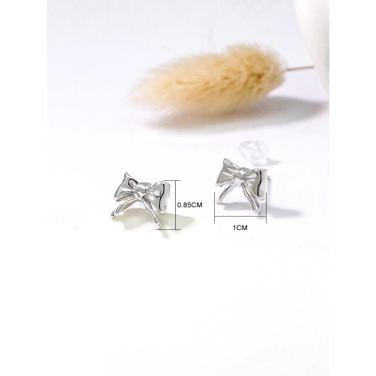 

Серьги-гвоздики с трехмерным бантом Niche Design для женщин, маленькие, сладкие, темпераментные, медные серьги, модные и персонализированные серьги