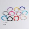Taylor Swift Friendship Bracelet: Pink Letters Inspired by Lover, Fearless, Anti-Hero, 1989, and Reputation.