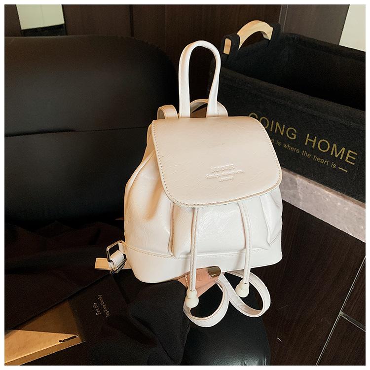 

Fashion small bag women s 2025 summer new backpack versatile design texture travel backpack білий