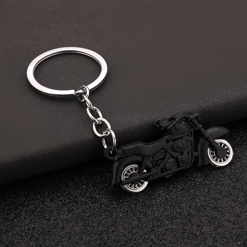 Klíčenka s motocyklovým kolem: Simulovaná pohyblivá ozdoba