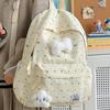 Mochila escolar al por mayor mochila escolar secundaria preparatoria corazón de niña lunares lazo versátil alto valor mochila para estudiante femenina