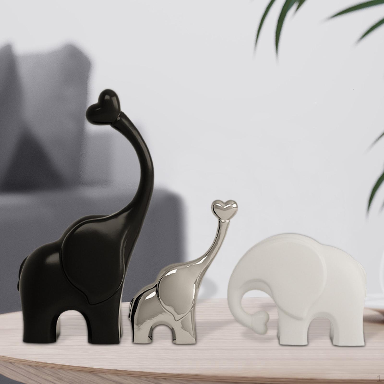 

3 фигурки семейства слонов для декоративных целей на столе Black White Silver