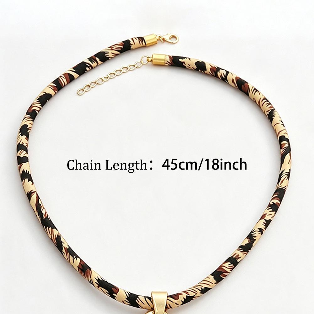 Matte Gold Sunflower Pendant Necklace with Leopard Print Design