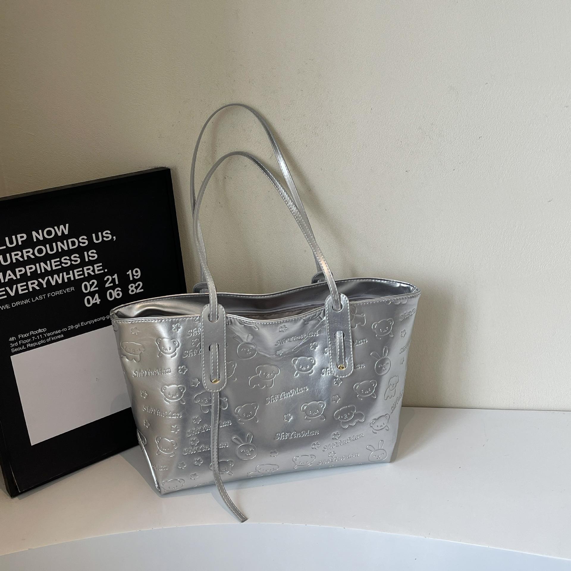 

Large-capacity bag women s new simple fashion shoulder bag trendy foreign style shoulder bag tote bag for spring and summer 2025 срібний
