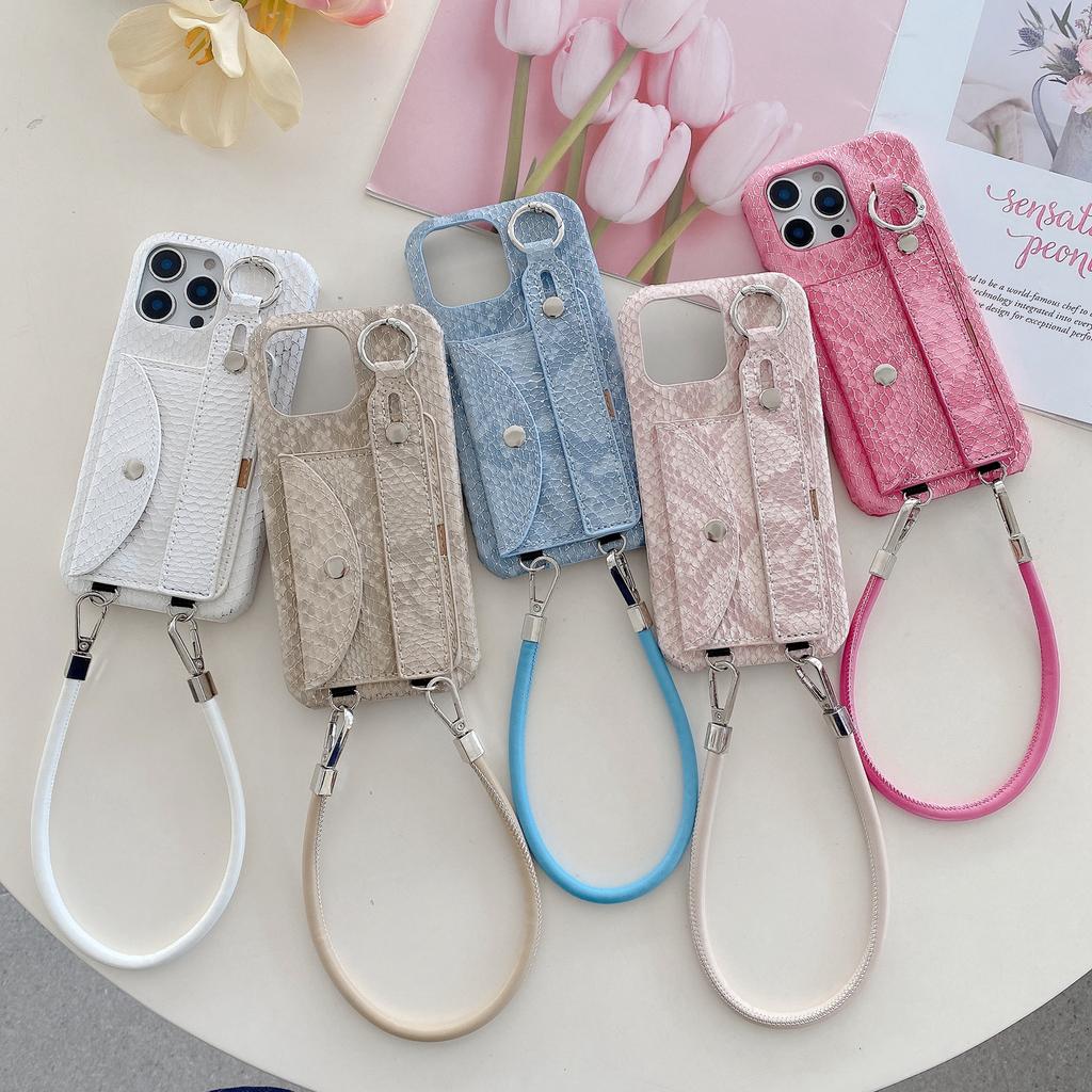 For iPhone 15 Pro Case Card Holder Wristband Lacquered Snake Texture PU+PC Back Cover with Lanyard