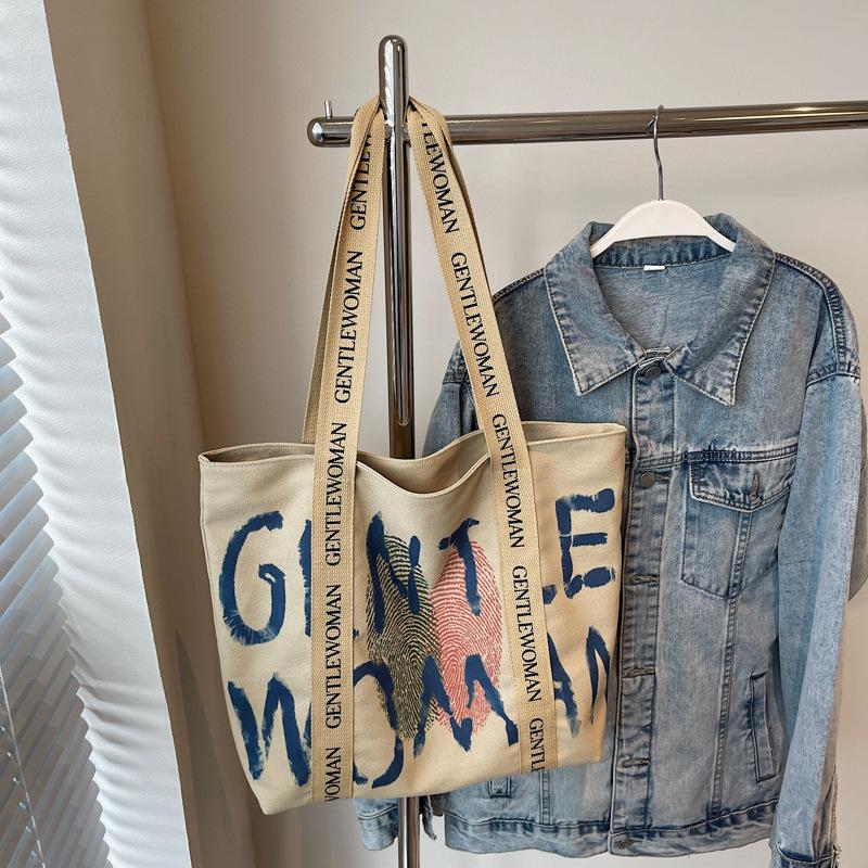 Canvas bag women's 2025 new shoulder bag casual large-capacity Korean version student schoolbag literary and leisure handbag bag