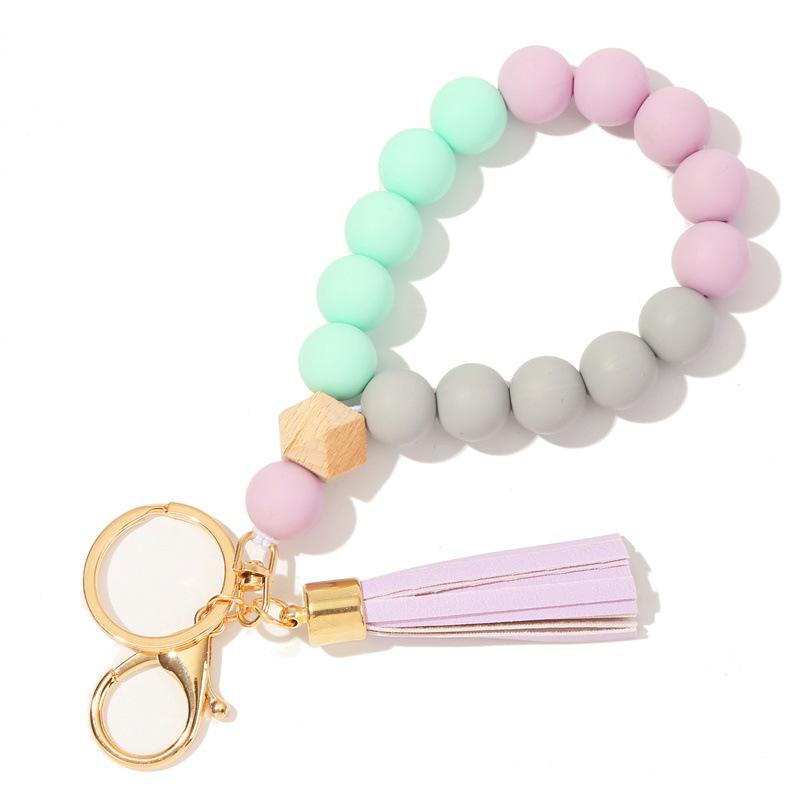 Silicone and Wooden Bead Keychain Bracelet with PU Tassel