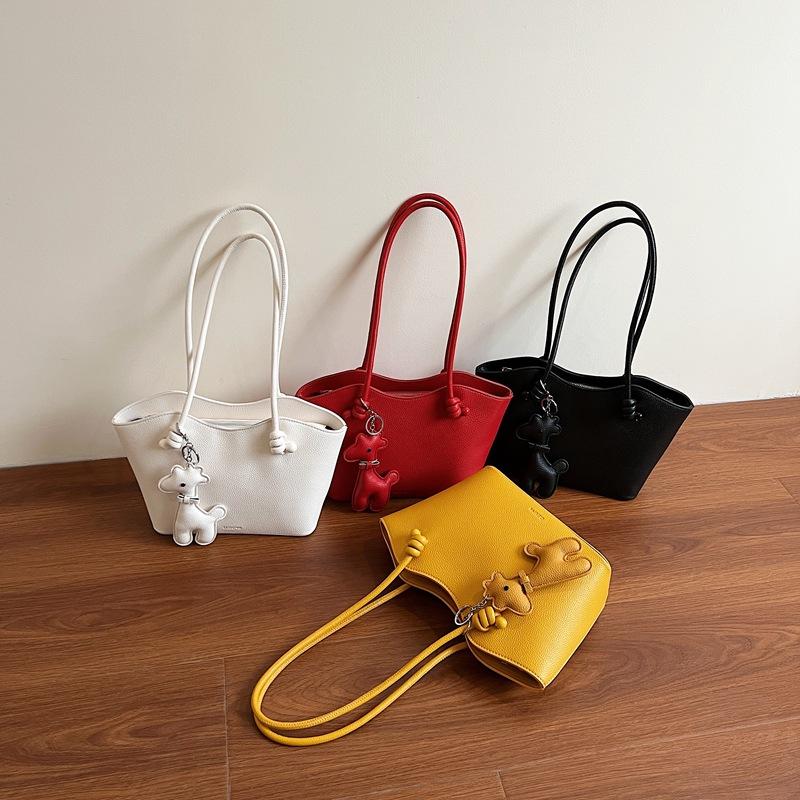 Hand carry versatile bucket bag women's 2025 new fashion texture shoulder bag large capacity casual messenger women's bag