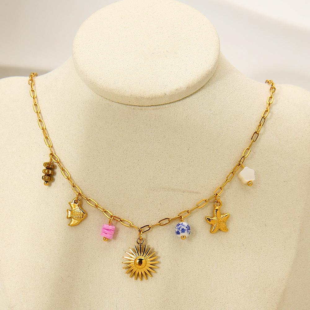 European and American ocean vacation wind plated 18k gold starfish tropical fish sun pendant necklace women's stainless steel jewelry