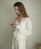 Eopaeleolakaibeu Peed Deep V-Neck Knit - Ivory
