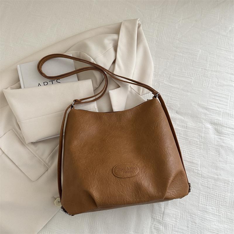 2025 Autumn New Korean Version Fashion Casual Shoulder Tote Bag Large Capacity Commuting Niche Simple Double Shoulder Women's Bag