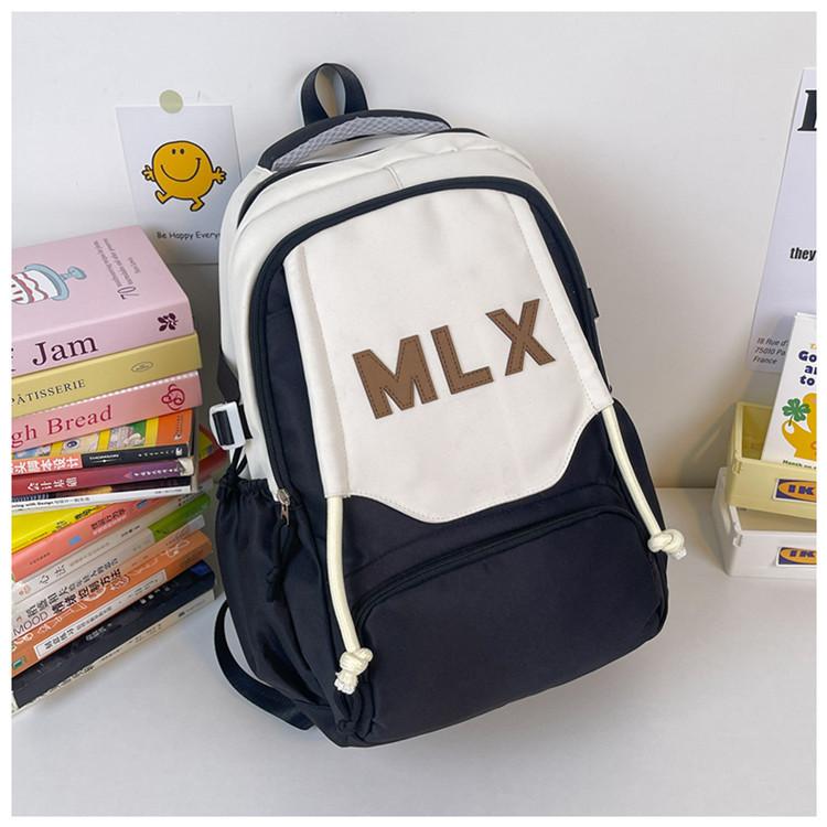 

New schoolbag for junior high school students and girls with large capacity for primary school students. Lightweight spine protection backpack bursts чорний