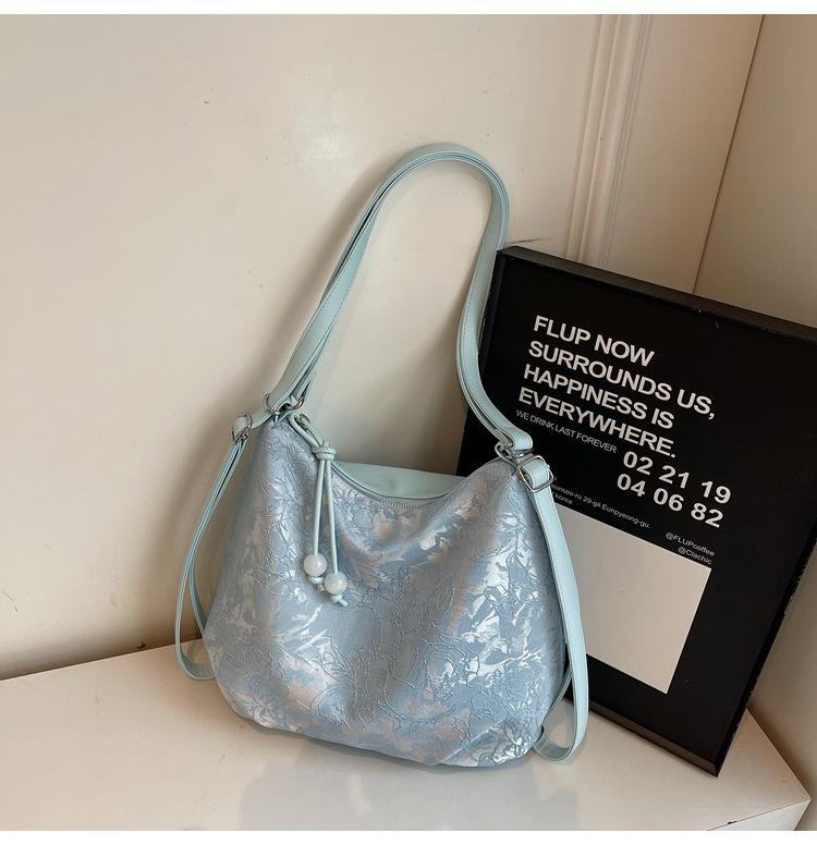 Large-capacity bag women's 2025 spring new niche simple casual versatile shoulder messenger bag fashionable tote bag