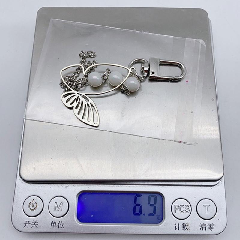 Elegant fjärilsnyckelring hänge för kvinnor snygg väska tillbehör telefonkedja prydnad hjärtpärlfärgad mobiltelefon hänge