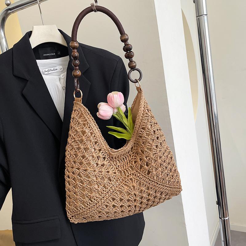 Summer fashion bag women 2025 new seaside beach hollow shoulder bag portable woven tote bag