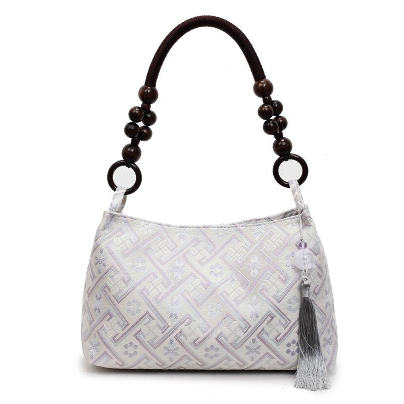 

New light luxury Zhongwan brocade shoulder bag temperament fashion leisure beauty elegant commuter women s bag фиолетовый