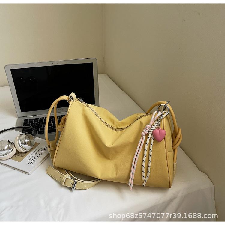

2025 new candy color canvas tote bag girl simple fashion pillow bag large capacity casual messenger bag жёлтый
